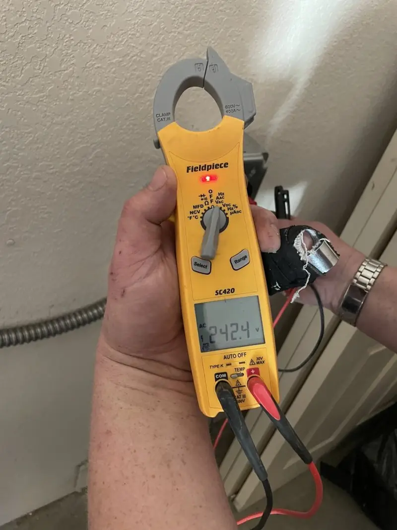 Voltage testing with clamp meter during Aluminum Wiring Replacement in Mansfield